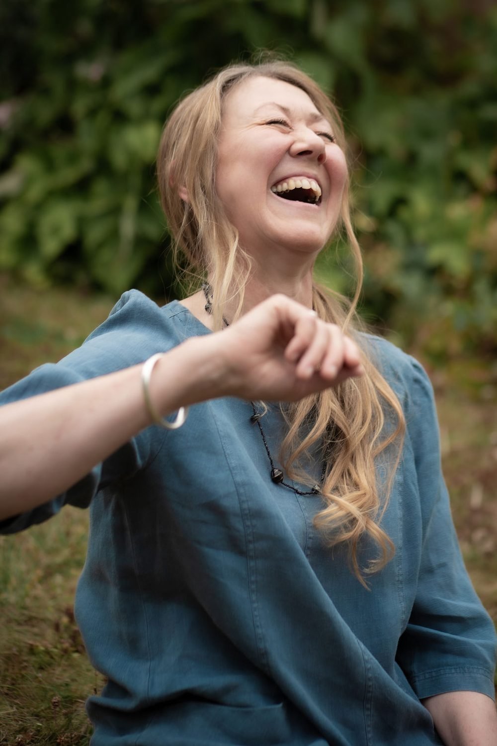 Julie Goodridge laughing outdoors