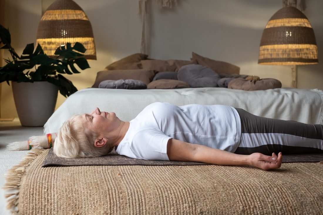 A person resting in deep relaxation at home